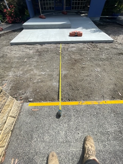Measuring and setting out asphalt works at school site